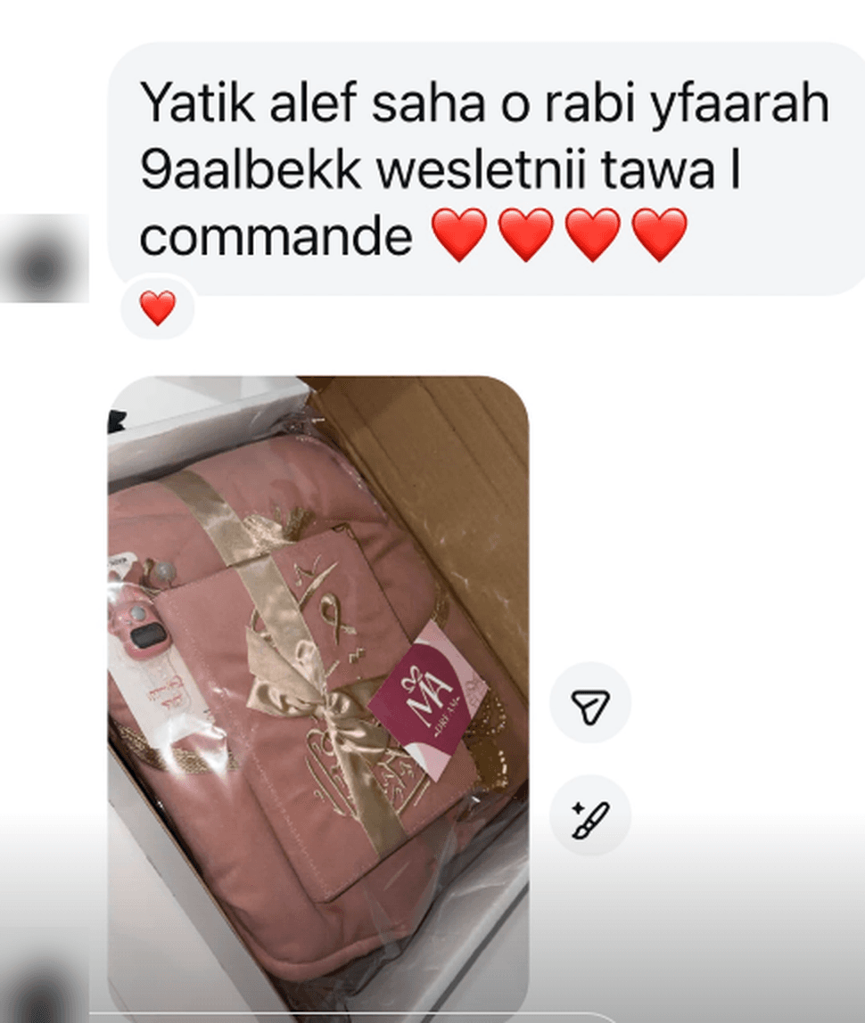 Message d'une cliente annonçant l'arrivée de sa commande, avec la photo du colis MA DREAM.